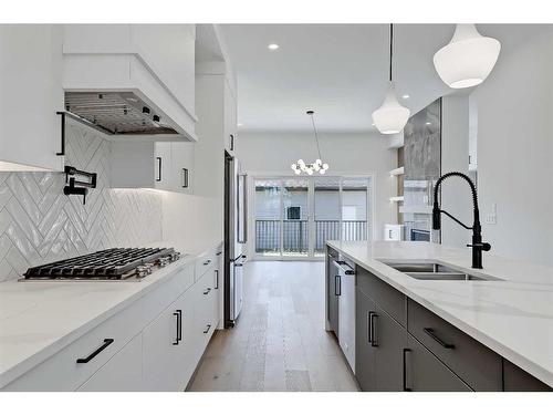 1141 Richland Road Ne, Calgary, AB - Indoor Photo Showing Kitchen With Stainless Steel Kitchen With Double Sink With Upgraded Kitchen