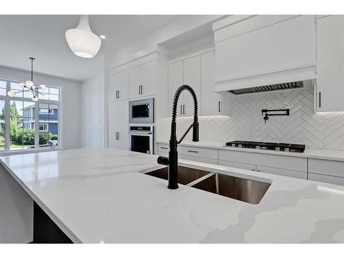 1141 Richland Road Ne, Calgary, AB - Indoor Photo Showing Kitchen With Double Sink With Upgraded Kitchen