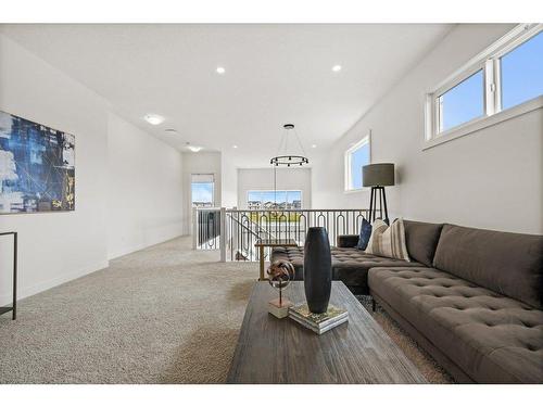 230 Creekside Way Sw, Calgary, AB - Indoor Photo Showing Living Room