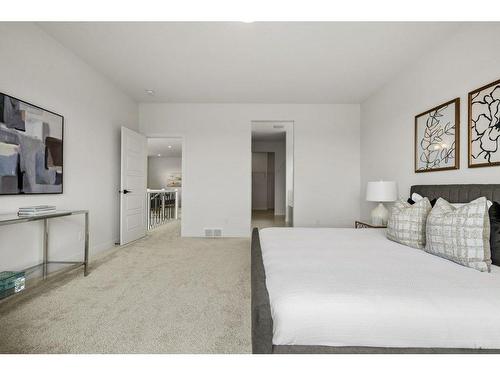 230 Creekside Way Sw, Calgary, AB - Indoor Photo Showing Bedroom