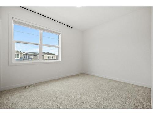 230 Creekside Way Sw, Calgary, AB - Indoor Photo Showing Other Room