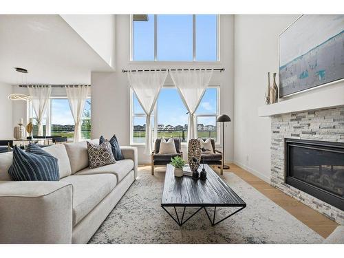 230 Creekside Way Sw, Calgary, AB - Indoor Photo Showing Living Room With Fireplace