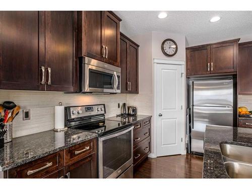 23 Panton Way Nw, Calgary, AB - Indoor Photo Showing Kitchen With Stainless Steel Kitchen With Upgraded Kitchen