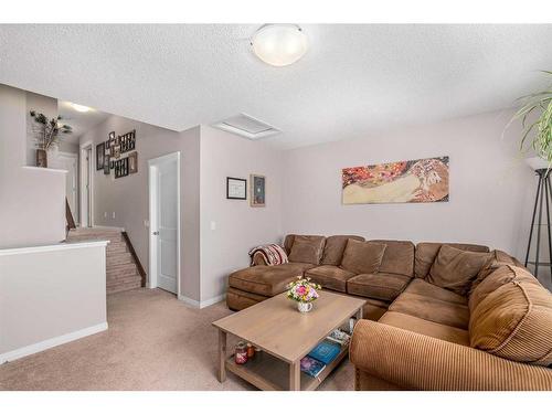 23 Panton Way Nw, Calgary, AB - Indoor Photo Showing Living Room