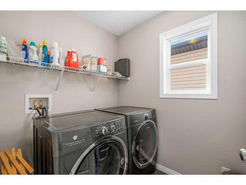 23 Panton Way Nw, Calgary, AB - Indoor Photo Showing Laundry Room