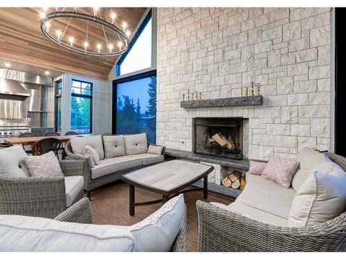 4308 Coronation Drive Sw, Calgary, AB - Indoor Photo Showing Living Room With Fireplace