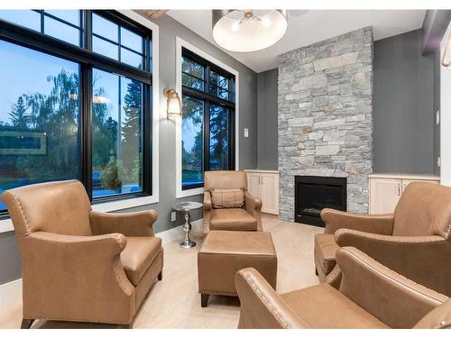 4308 Coronation Drive Sw, Calgary, AB - Indoor With Fireplace