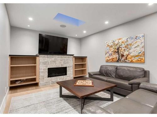 4308 Coronation Drive Sw, Calgary, AB - Indoor Photo Showing Living Room With Fireplace