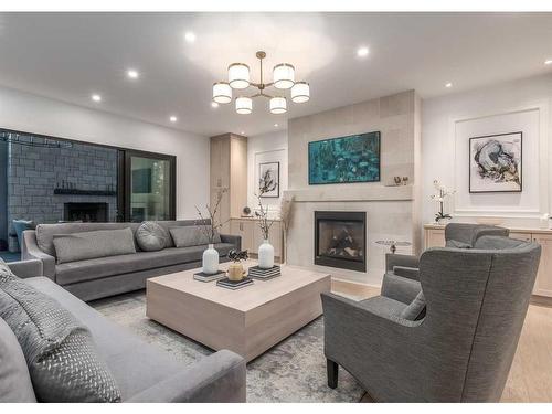 4308 Coronation Drive Sw, Calgary, AB - Indoor Photo Showing Living Room With Fireplace