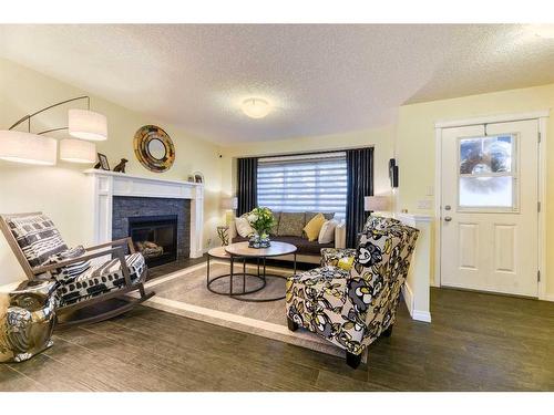 172 Legacy Crescent Se, Calgary, AB - Indoor Photo Showing Living Room With Fireplace