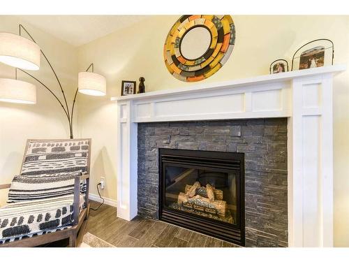 172 Legacy Crescent Se, Calgary, AB - Indoor Photo Showing Living Room With Fireplace