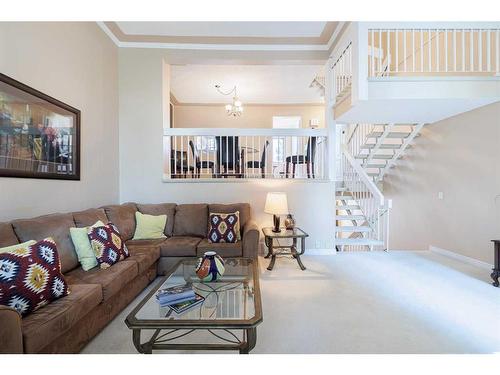 4-10457 19 Street Sw, Calgary, AB - Indoor Photo Showing Living Room