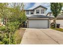 77 Rockbluff Place Nw, Calgary, AB  - Outdoor With Facade 