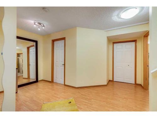 77 Rockbluff Place Nw, Calgary, AB - Indoor Photo Showing Other Room