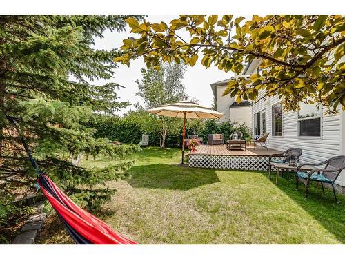 77 Rockbluff Place Nw, Calgary, AB - Outdoor With Deck Patio Veranda