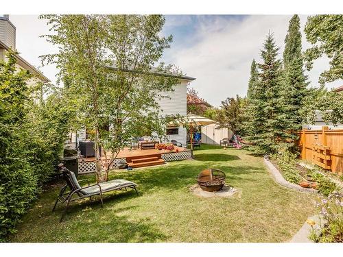 77 Rockbluff Place Nw, Calgary, AB - Outdoor With Deck Patio Veranda