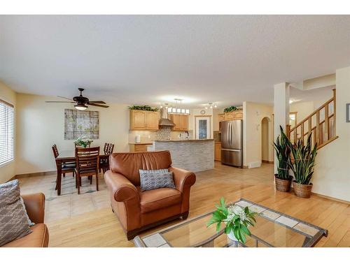 77 Rockbluff Place Nw, Calgary, AB - Indoor Photo Showing Living Room