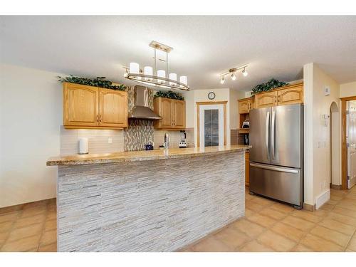 77 Rockbluff Place Nw, Calgary, AB - Indoor Photo Showing Kitchen