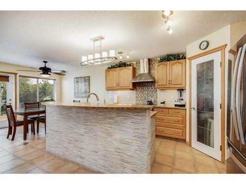 77 Rockbluff Place Nw, Calgary, AB - Indoor Photo Showing Kitchen