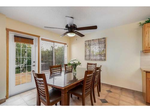 77 Rockbluff Place Nw, Calgary, AB - Indoor Photo Showing Dining Room