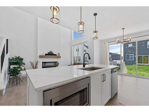 28 Walcrest Row Se, Calgary, AB - Indoor Photo Showing Kitchen With Double Sink With Upgraded Kitchen