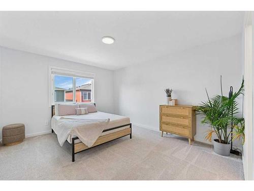 28 Walcrest Row Se, Calgary, AB - Indoor Photo Showing Bedroom