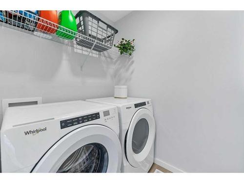 28 Walcrest Row Se, Calgary, AB - Indoor Photo Showing Laundry Room