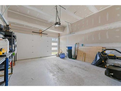 28 Walcrest Row Se, Calgary, AB - Indoor Photo Showing Garage