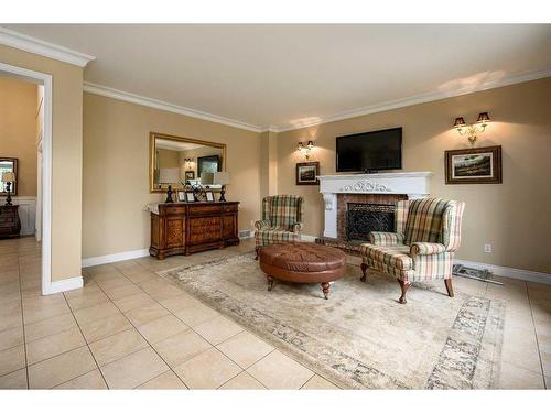 11067 Valley Springs Road Nw, Calgary, AB - Indoor Photo Showing Living Room With Fireplace