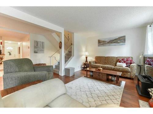 42-200 Shawnessy Drive Sw, Calgary, AB - Indoor Photo Showing Living Room