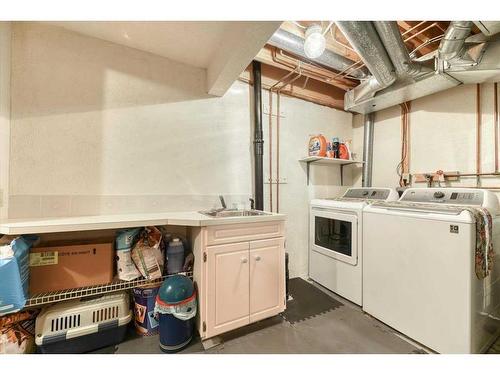 42-200 Shawnessy Drive Sw, Calgary, AB - Indoor Photo Showing Laundry Room