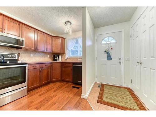 42-200 Shawnessy Drive Sw, Calgary, AB - Indoor Photo Showing Kitchen