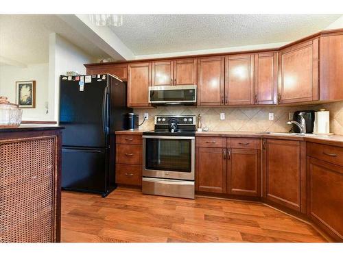 42-200 Shawnessy Drive Sw, Calgary, AB - Indoor Photo Showing Kitchen