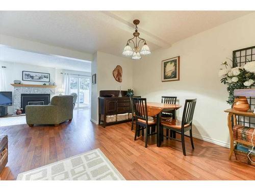 42-200 Shawnessy Drive Sw, Calgary, AB - Indoor With Fireplace