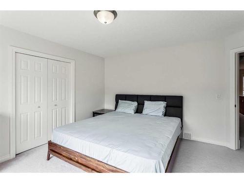 11 Evercreek Bluffs Road Sw, Calgary, AB - Indoor Photo Showing Bedroom