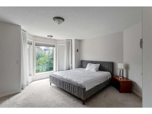 11 Evercreek Bluffs Road Sw, Calgary, AB - Indoor Photo Showing Bedroom