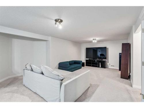 11 Evercreek Bluffs Road Sw, Calgary, AB - Indoor Photo Showing Living Room