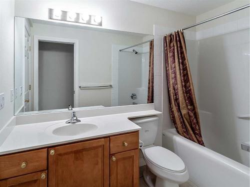 11 Evercreek Bluffs Road Sw, Calgary, AB - Indoor Photo Showing Bathroom
