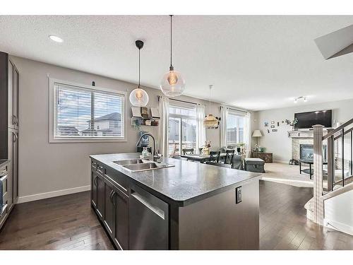 1016 Ranch Road, Okotoks, AB - Indoor Photo Showing Kitchen With Double Sink