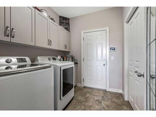 1016 Ranch Road, Okotoks, AB - Indoor Photo Showing Laundry Room