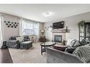 1016 Ranch Road, Okotoks, AB  - Indoor Photo Showing Living Room With Fireplace 