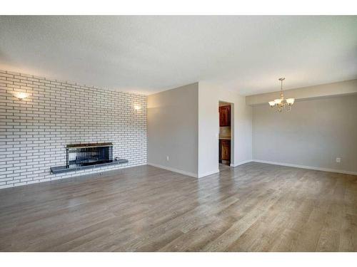 252 Parkside Way Se, Calgary, AB - Indoor Photo Showing Living Room With Fireplace