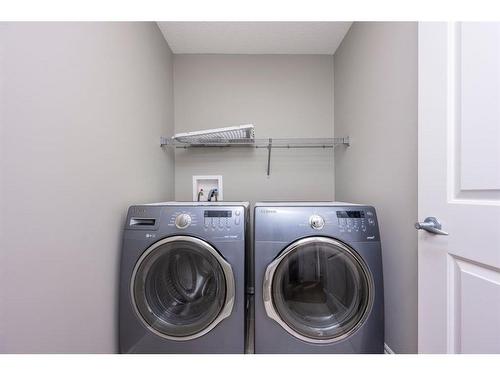 85 Sherwood Heights Nw, Calgary, AB - Indoor Photo Showing Laundry Room