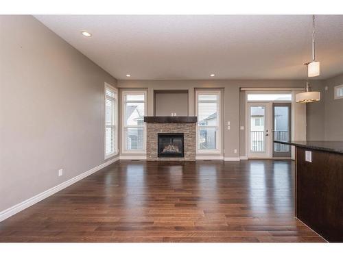 85 Sherwood Heights Nw, Calgary, AB - Indoor Photo Showing Living Room With Fireplace