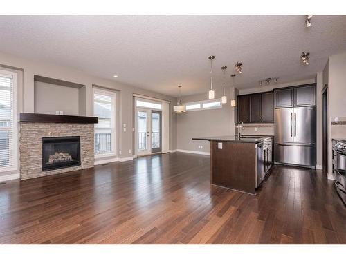 85 Sherwood Heights Nw, Calgary, AB - Indoor With Fireplace