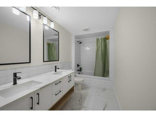 54 Malibou Road Sw, Calgary, AB - Indoor Photo Showing Bathroom