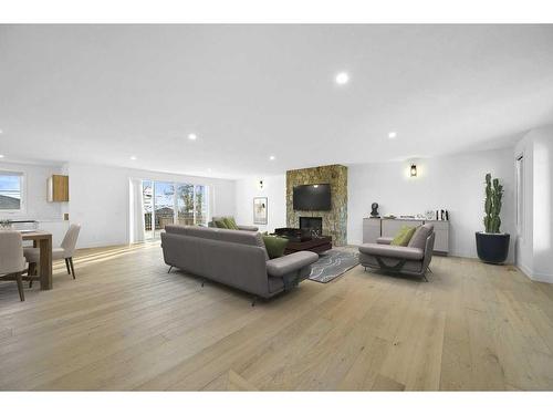 54 Malibou Road Sw, Calgary, AB - Indoor Photo Showing Living Room