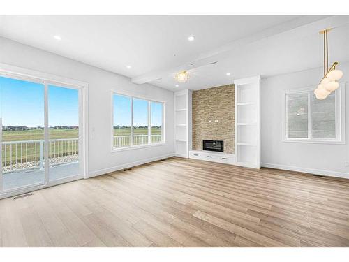 331 Muirfield Crescent, Lyalta, AB - Indoor Photo Showing Living Room With Fireplace