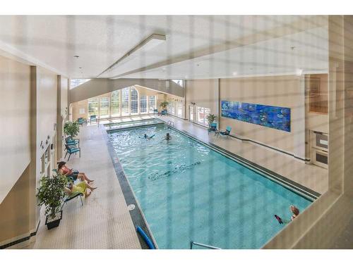 280-223 Tuscany Springs Boulevard Nw, Calgary, AB - Indoor Photo Showing Other Room With In Ground Pool