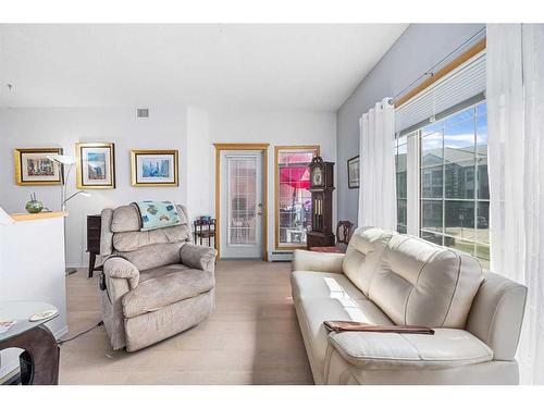 280-223 Tuscany Springs Boulevard Nw, Calgary, AB - Indoor Photo Showing Living Room